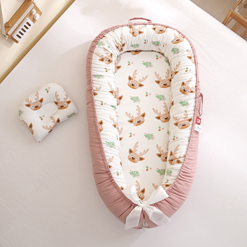 reducteur de lit rose motif cerf cocon evolutif