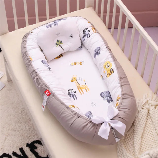 reducteur de lit pour bebe gris coton cocooning