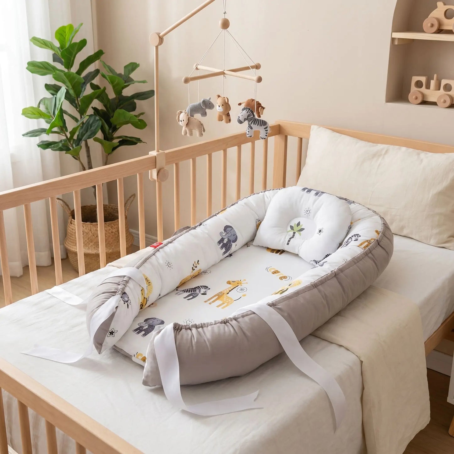 reducteur de lit pour bebe pliable coton cocooning