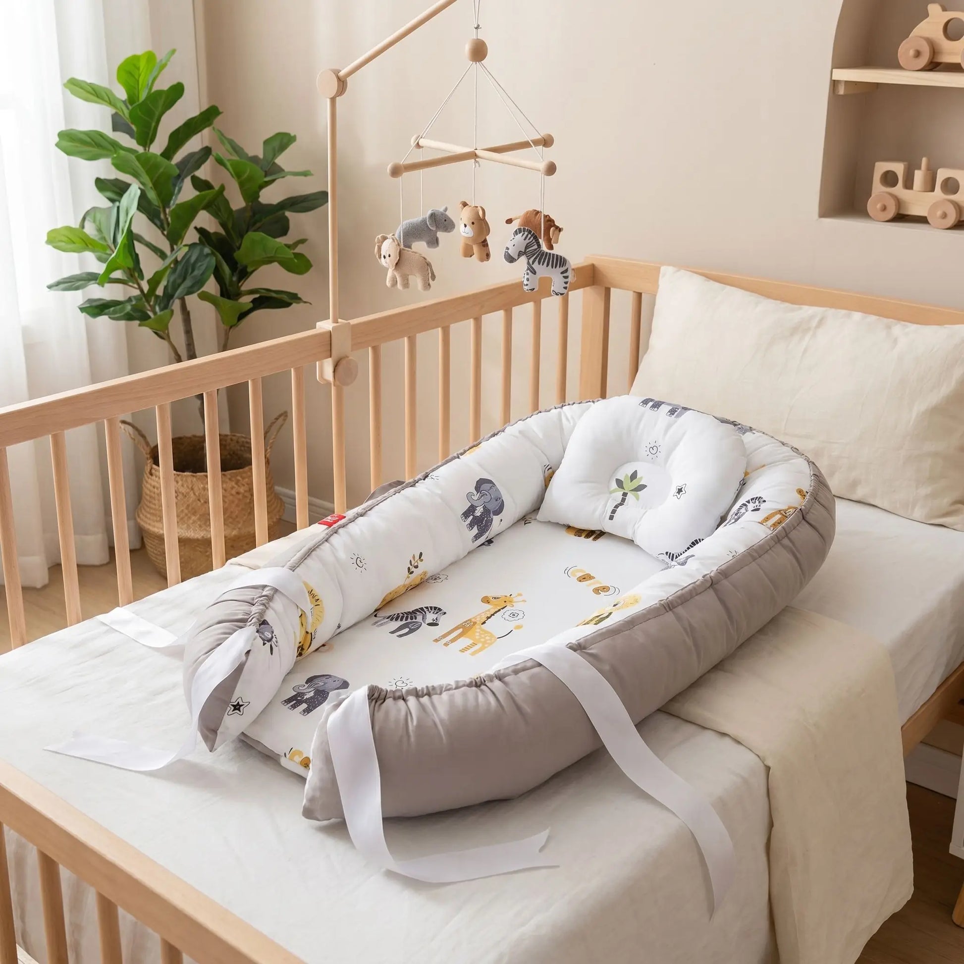 reducteur de lit pour bebe pliable coton cocooning